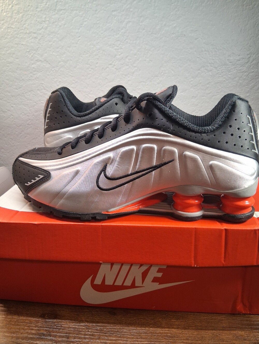 Nike Men’s Silver, Black & Orange Shox Running Sneakers